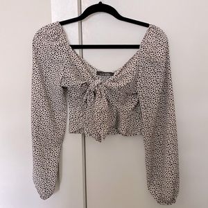 Blue blush blouse with front tie. Size medium. NWOT.